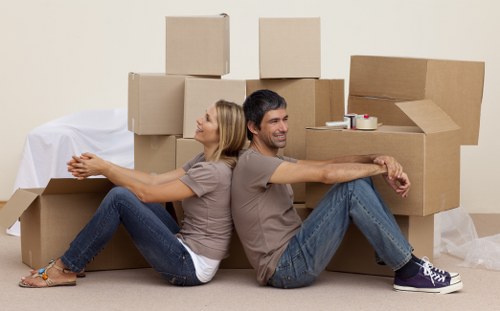 Packed moving boxes and furniture ready for transport in Sydenham Hill