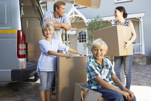 Packed boxes and furniture prepared for a house move in Sydenham Hill